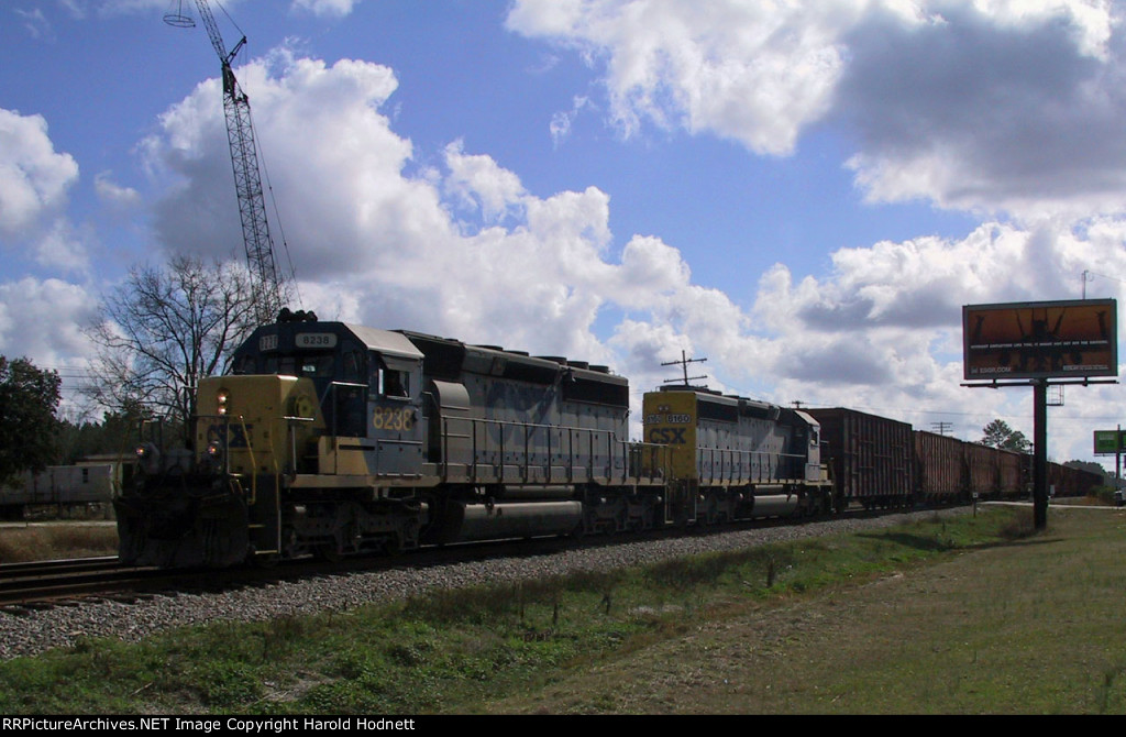 CSX 8238 & 8160 lead a train northbound